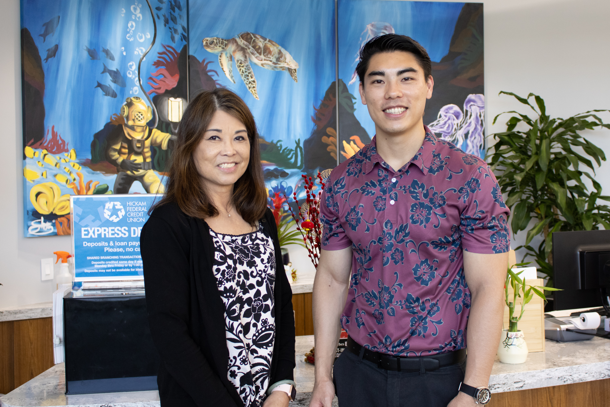 Hickam FCU Mortgage Loan Operations Assistant Manager Dana with first-time homebuyer Cody
